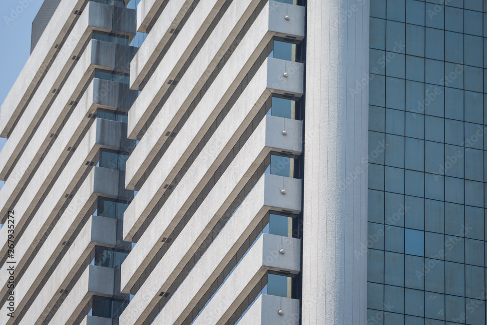 Modern office building with blue glass windows Modern office building with blue glass windows