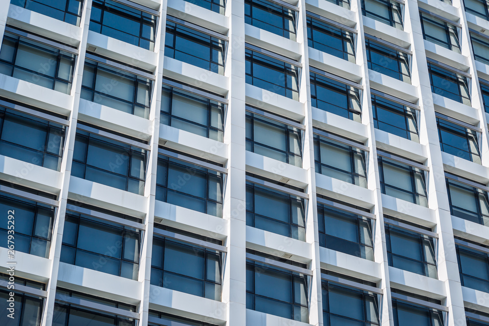 Windows of white building Windows of white building