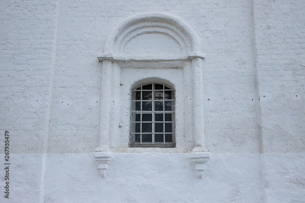 Ancient Russian architecture authentic Windows with bars in the old monastery, Kolomna Russia Ancient Russian architecture authentic Windows with bars in the old monastery, Kolomna Russia
