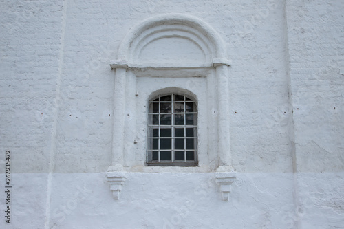 Ancient Russian architecture authentic Windows with bars in the old monastery, Kolomna Russia