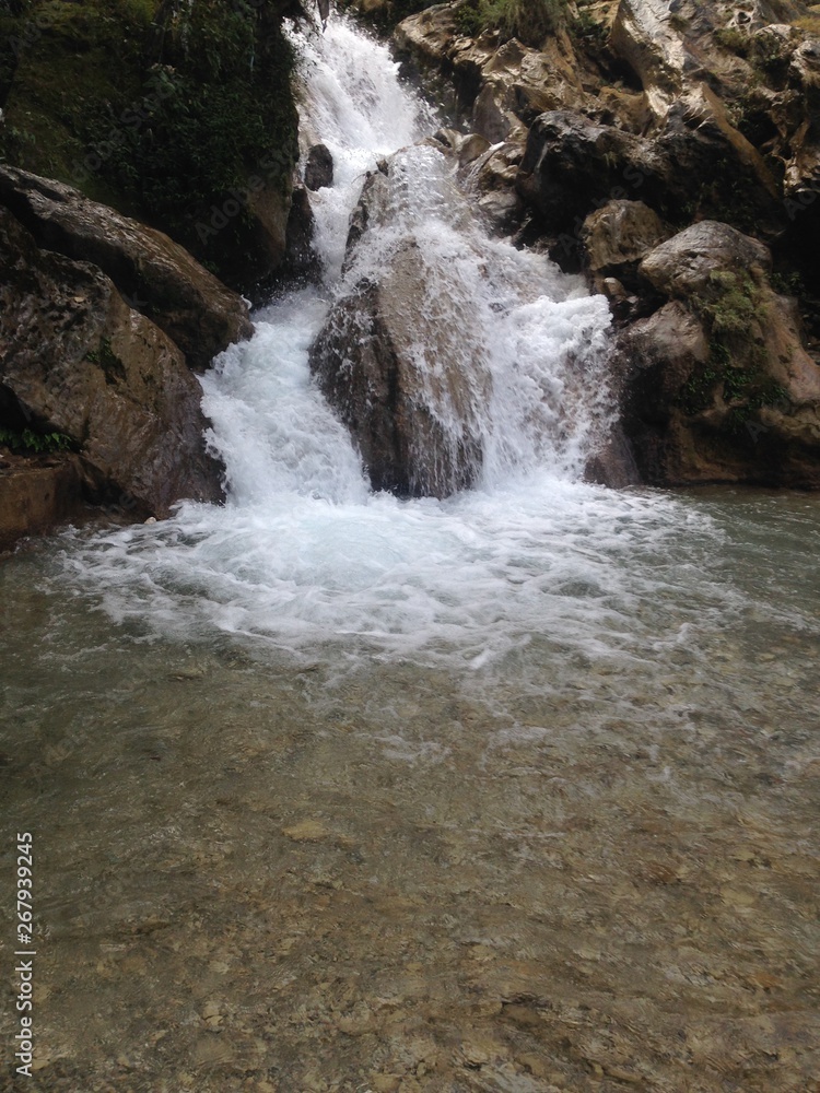 Mountain river waterfall view.Waterfall mountain close up Mountain river waterfall view.Waterfall mountain close up