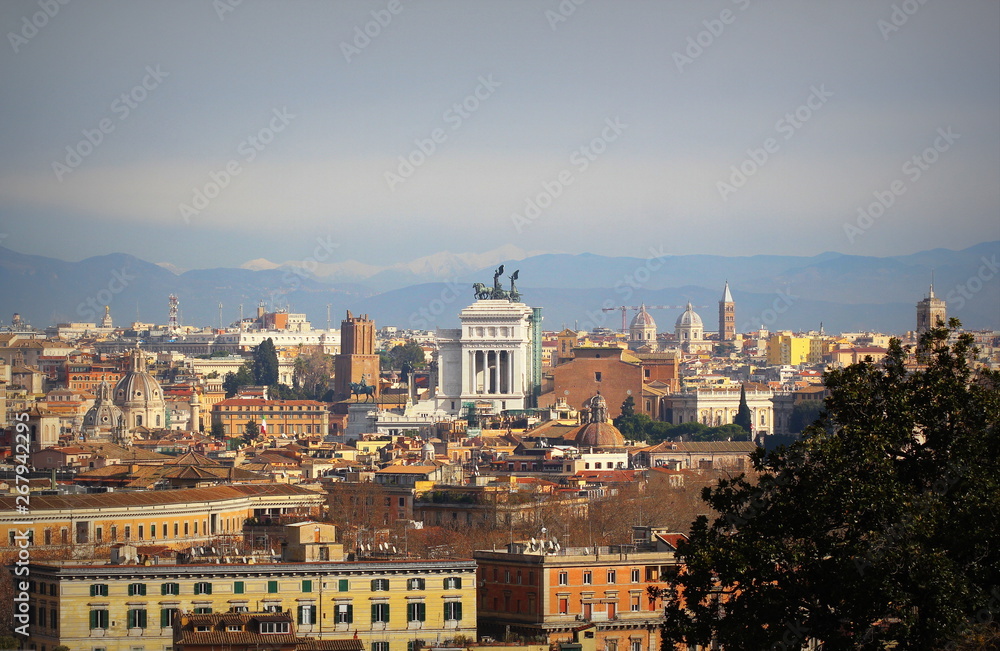 Panoramic view over the historic center of Rome, Italy from from Janiculum hill and terrace, with Vittoriano, Trinità dei Monti church and Quirinale palace.