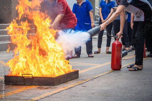 Employees firefighting training,Extinguish a fire. photo