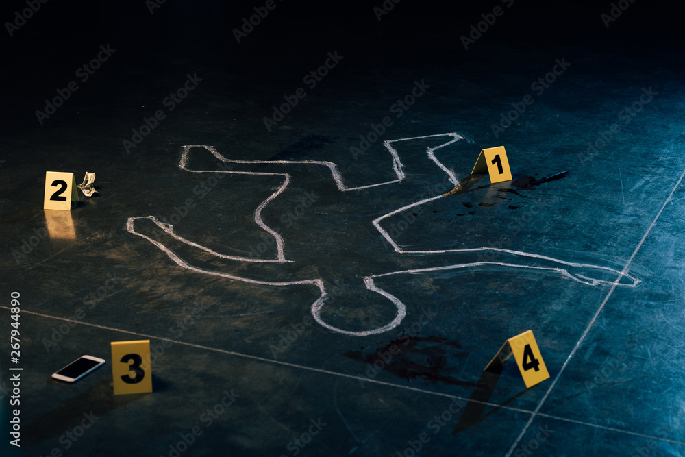 chalk outline and evidence markers at crime scene Stock Photo | Adobe Stock