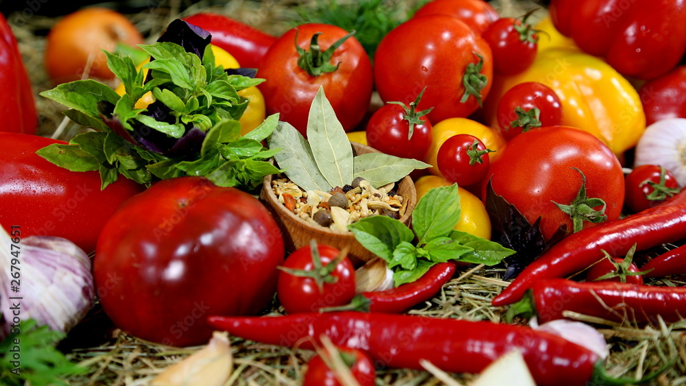 Red tomatoes, peppers, spices, herbs. Different fresh vegetables Red tomatoes, peppers, spices, herbs. Different fresh vegetables