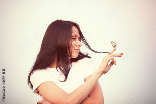 portrait of a pensive woman with black hair, brunette