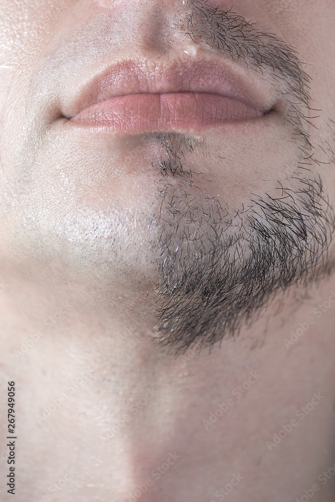 Obraz premium A man's half-shaved chin. White young man shaving.
