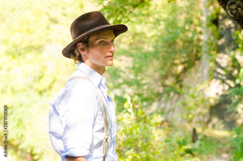 Sexy young man with hat photo