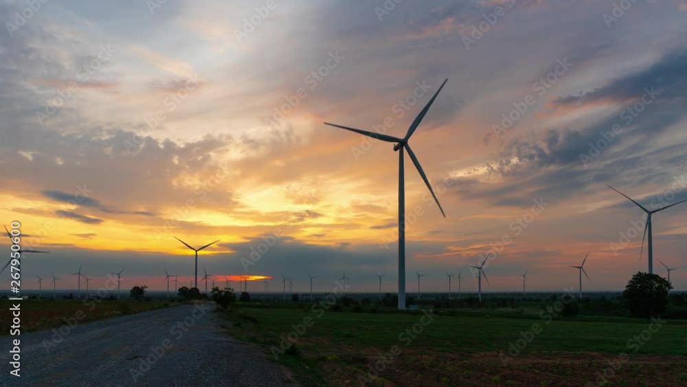Time-Lapse wind turbines on the fields Power generation using energy from clean energy wind may be the energy of the future. Time-Lapse wind turbines on the fields Power generation using energy from clean energy wind may be the energy of the future.
