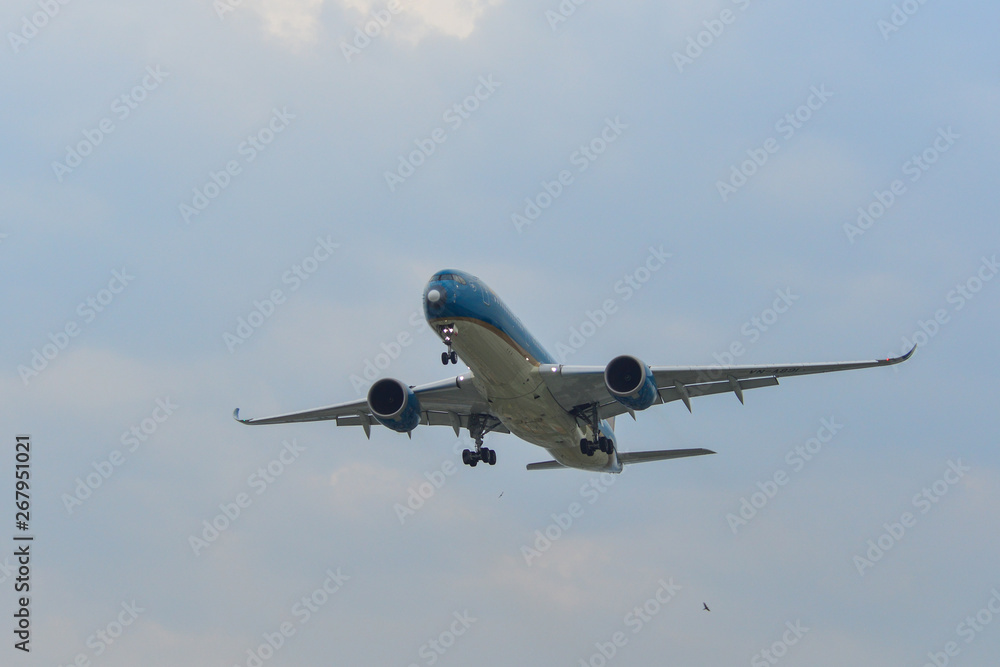 Airplane landing at Saigon Airport (SGN) Airplane landing at Saigon Airport (SGN)
