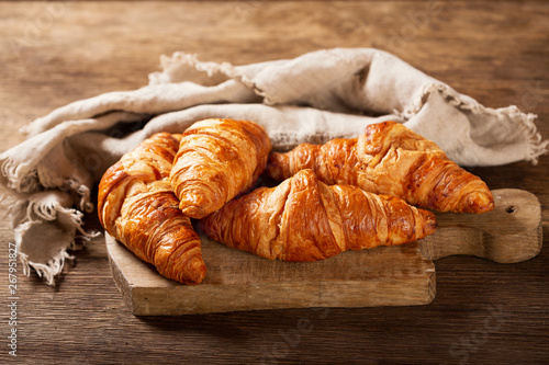 croissants on wooden board photo