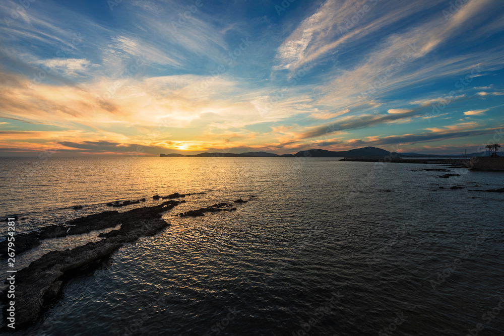 amazing colorful sunset in the Gulf of Alghero