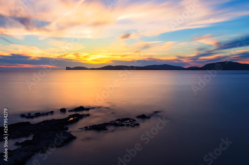 long exposure of a sunset in the Gulf of Alghero