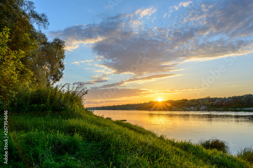 Sunset on the river. Bank of the Oka River. Summer evening