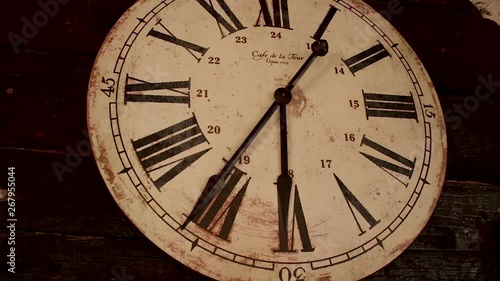 Medium shot pan around of old clock