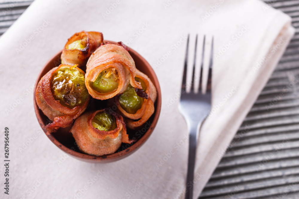 fresh green Brussels sprouts wrapped in fragrant smoked bacon