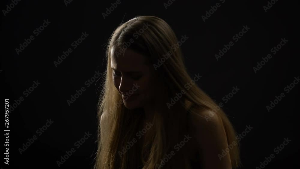 Blonde woman sobbing and crying, suffering because of break-up or divorce Blonde woman sobbing and crying, suffering because of break-up or divorce