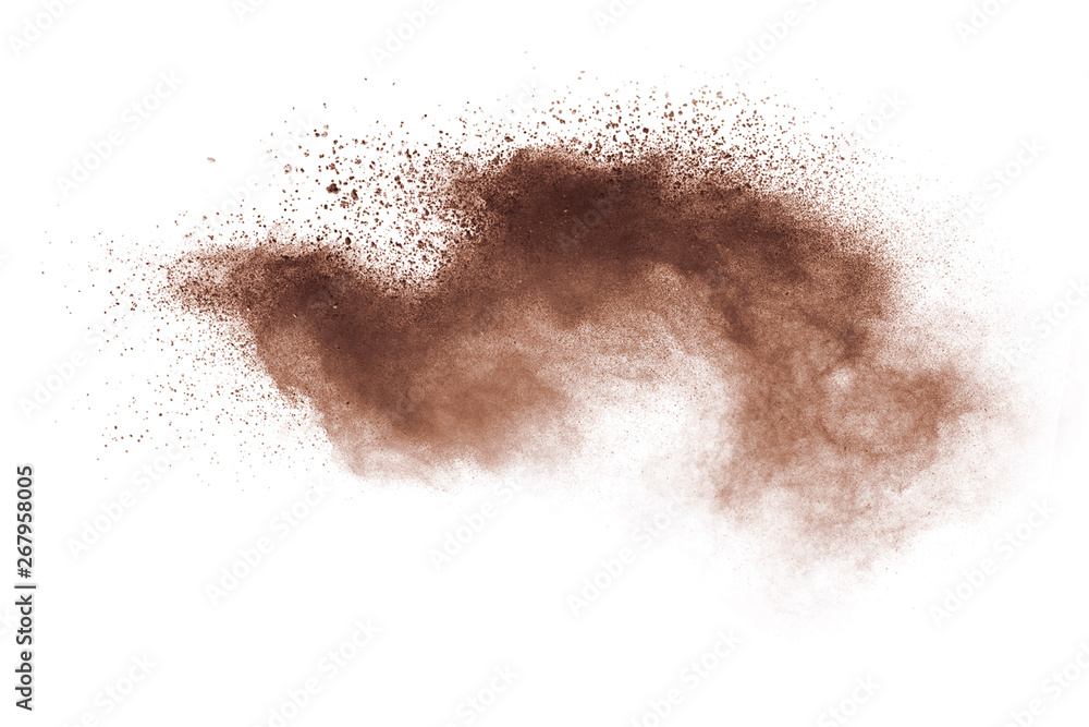 Abstract brown powder explosion on white background.