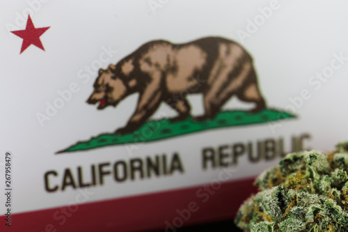 Medical Cannabis in  California - frosty medical cannabis and flag of California background.