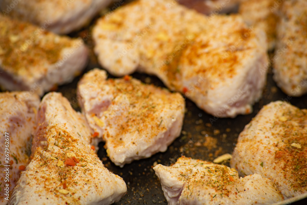 Spices on a piece of meat