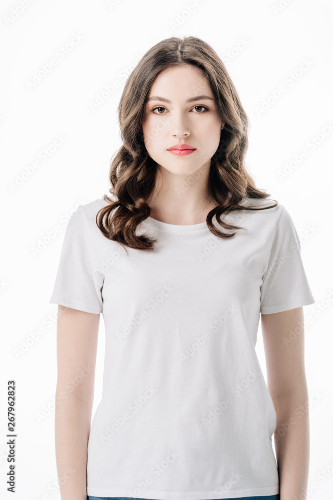 beautiful serious girl in white t-shirt looking at camera isolated on white beautiful serious girl in white t-shirt looking at camera isolated on white