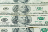 Background of one hundred dollar bills. Benjamin Franklin on USA money banknote	
