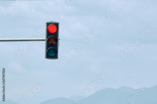Traffic light for cars on road.