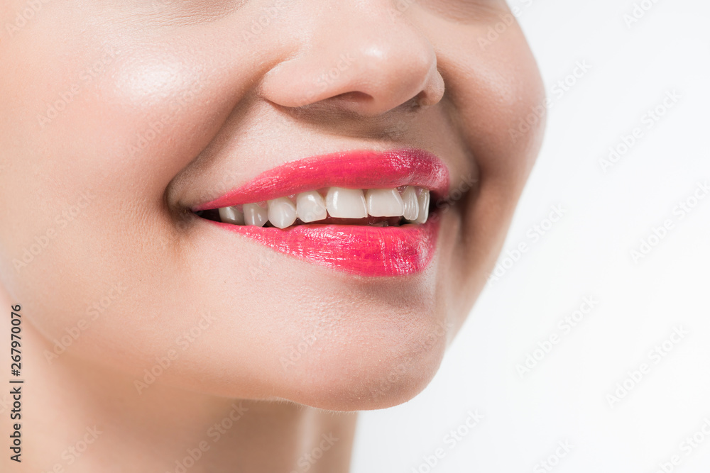cropped view of young woman with pink lips smiling isolated on white cropped view of young woman with pink lips smiling isolated on white