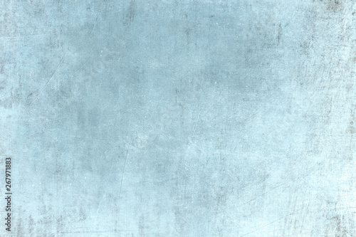 Old blue grungy wall background or texture