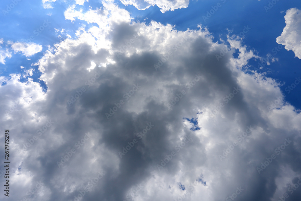 White huge cloud against the blue sky photo White huge cloud against the blue sky photo