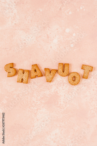 Crackers Arranged as a Word Shavout photo