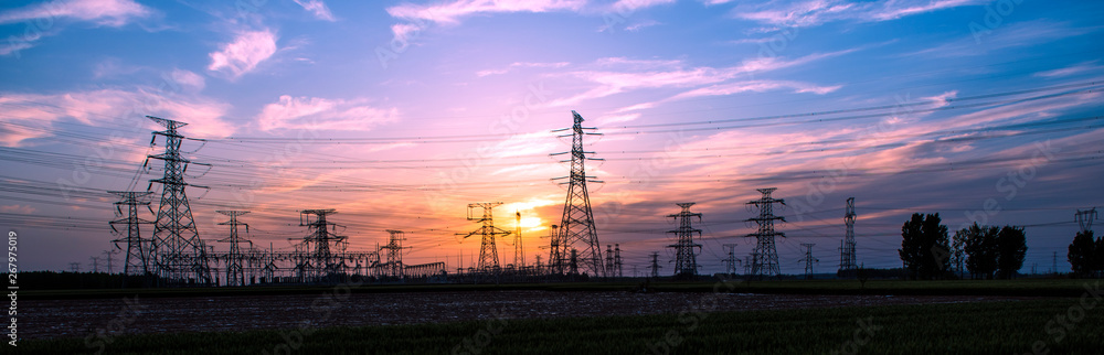 Silhouette of Power Supply Facilities at Sunset