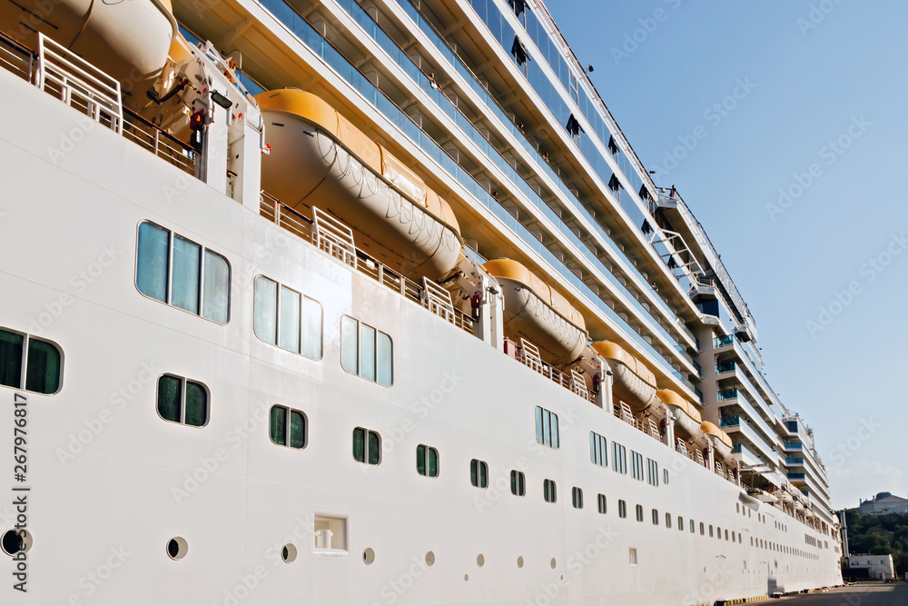 Naklejka premium open deck of a cruise ship near the pier.