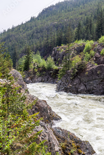 Majestic mountain river in Vancouver  Canada. View with mountain background.