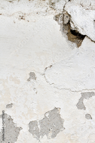 Stained and cracked cement wall texture © denizbayram