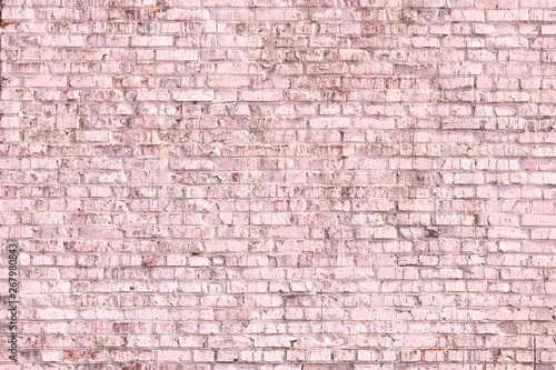 Unusual bright saturated abstract pink background from old brick wall in retro style