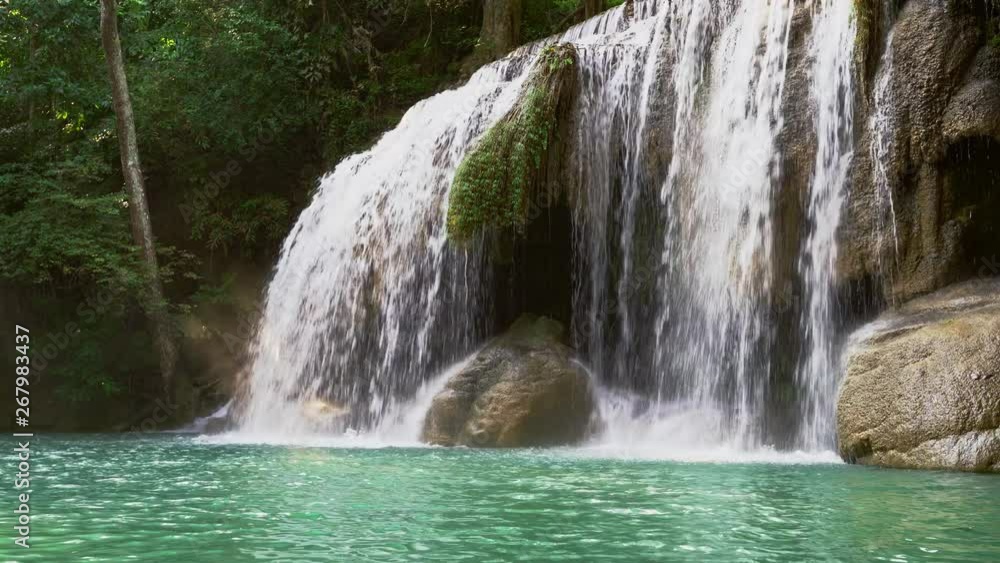 Erawan water fall (Second floor), tropical rainforest at Srinakarin Dam, Kanchanaburi, Thailand.Erawan water fall is beautiful waterfall in Thailand. Unseen Thailand Erawan water fall (Second floor), tropical rainforest at Srinakarin Dam, Kanchanaburi, Thailand.Erawan water fall is beautiful waterfall in Thailand. Unseen Thailand
