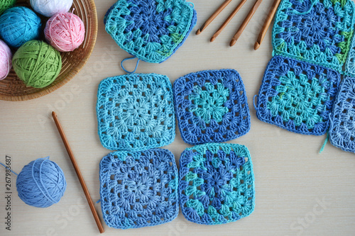 Photography Equipment for knitting and crochet hook, colorful rainbow cotton yarn, ball of threads, wool, knitted elements, napkin