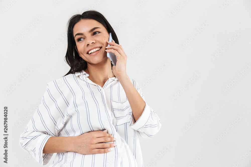Smiling young pregnant businesswoman Smiling young pregnant businesswoman