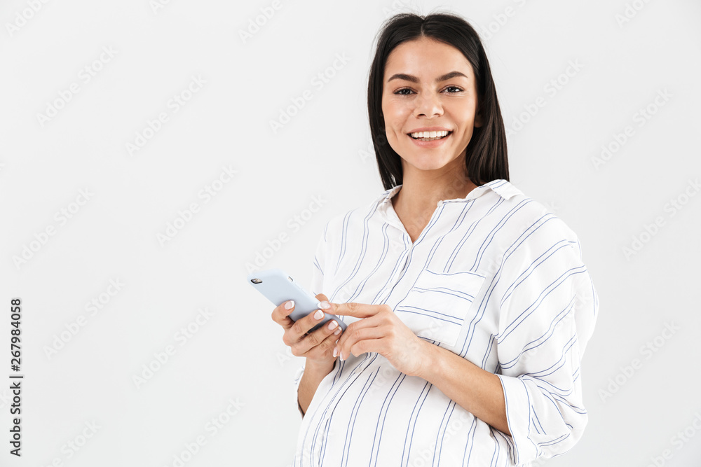 Smiling young pregnant businesswoman Smiling young pregnant businesswoman