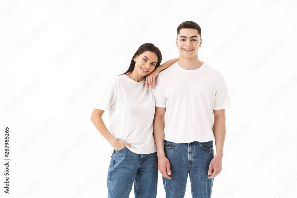 Portrait of a young casual wear couple standing