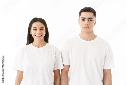 Portrait of a young casual wear couple standing