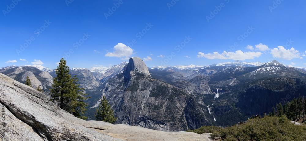 Panorama view of Half Dome. It is a granite dome in Yosemite National Park, California. Landmark of Yosemite NP. View from Glacier Point.
