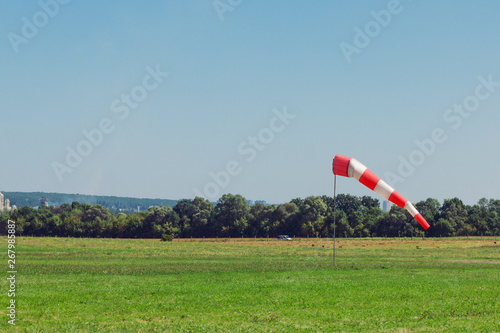 Windsock as a gauge for winds, wind vane on aerodrome airfield on an air show