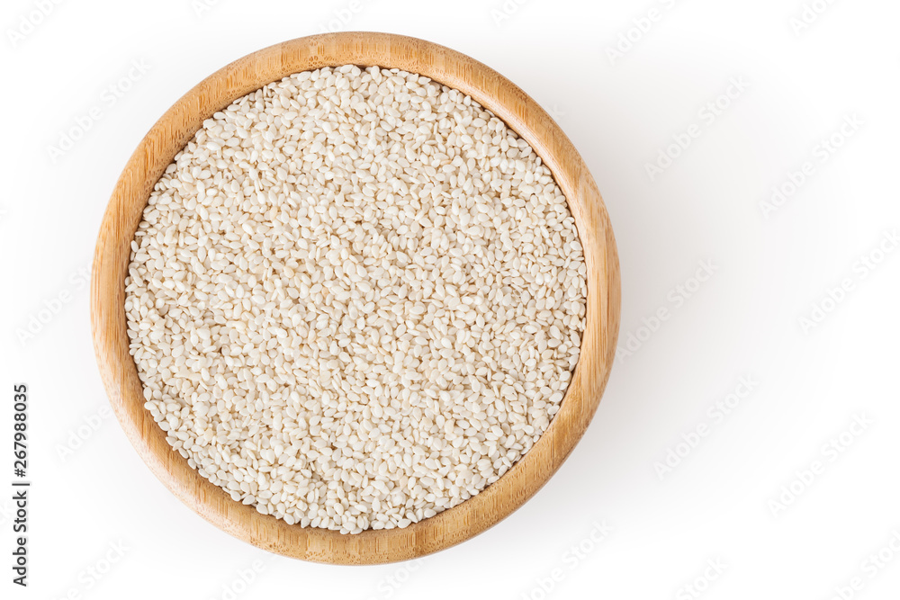 Sesame seeds in wooden bowl isolated on white background with clipping path Sesame seeds in wooden bowl isolated on white background with clipping path