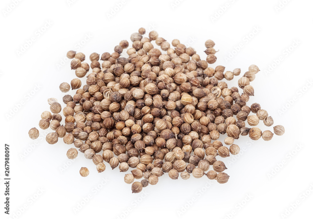 Heap of dried coriander seeds isolated on white background Heap of dried coriander seeds isolated on white background