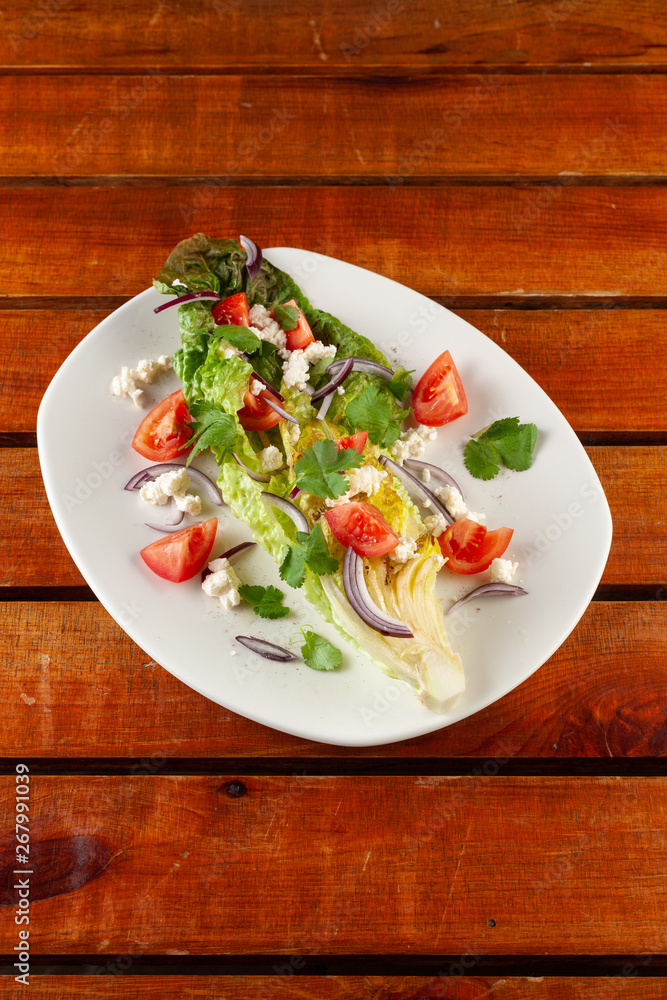Summer vegetable salad with tomatoes and greens Summer vegetable salad with tomatoes and greens