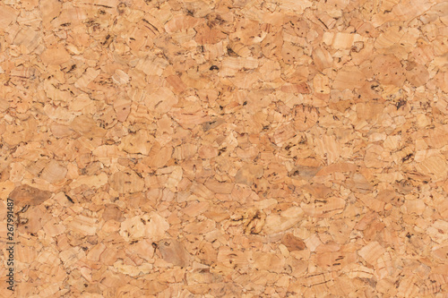 Abstract brown corkboard or cockboard texture background. Natural wood surface for material design element. Beige cork board wallpaper