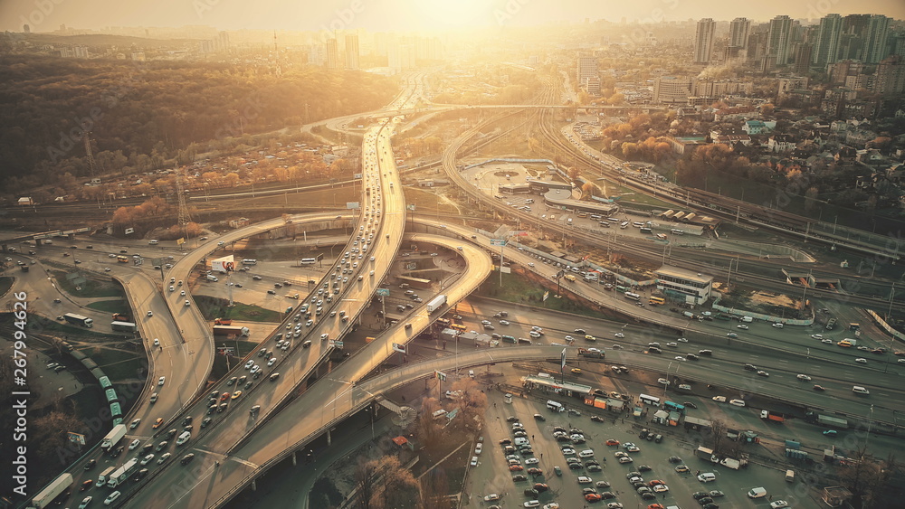 City Road System with Sight Traffic Jam Aerial View. Urban Congested  Highway Lane Transport Navigation Scene. Busy Downtown Building Vehicle at  Sunset. Travel Concept Drone Flight Shot foto de Stock | Adobe