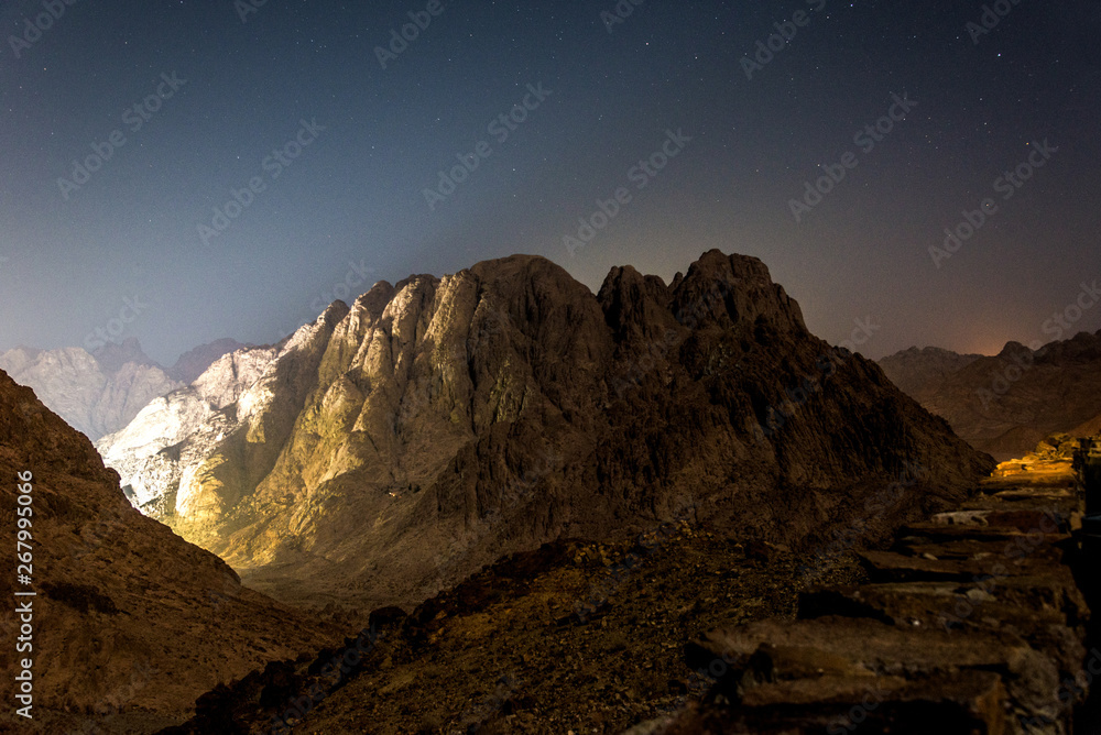 night landscape with views of the high mountains and the starry sky